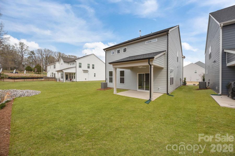 Exterior details and patio area of a home in Farms at Bellingham, Mooresville (Image 21).