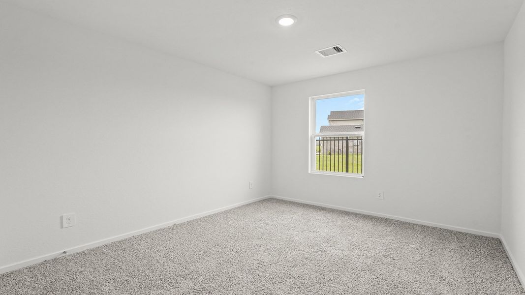Spacious, unfurnished interior of a new home in Sunterra, Katy (Image 14).