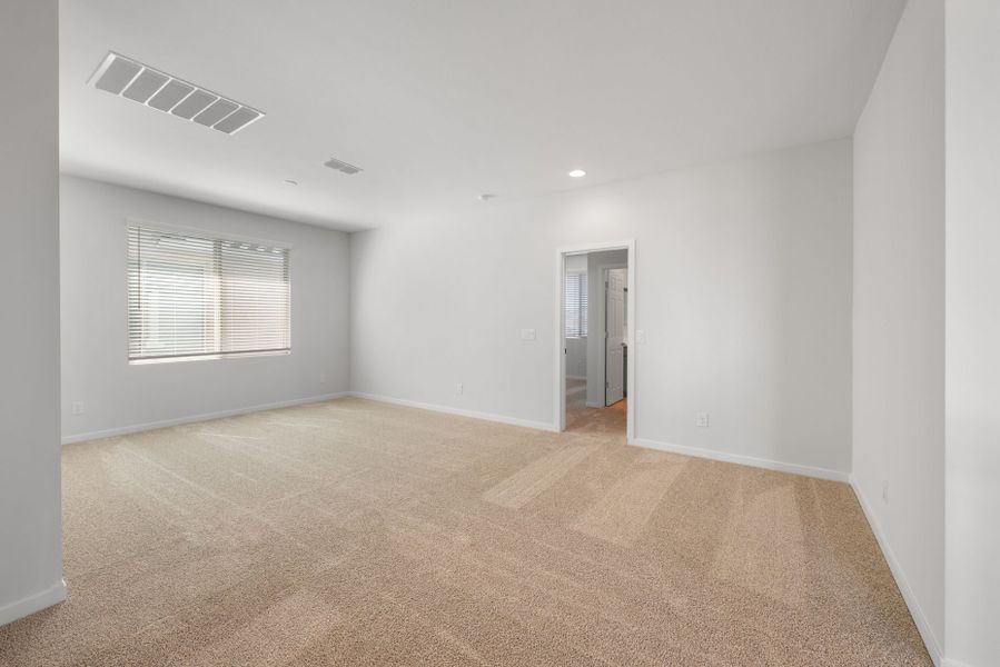 Spacious, unfurnished interior of a new home in Blossom Rock, Apache Junction (Image 32).