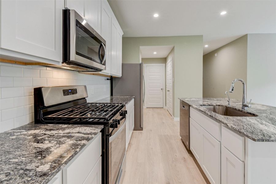 Furnished interior view inside a new home in Post Oak Pointe, Fresno (Image 8).