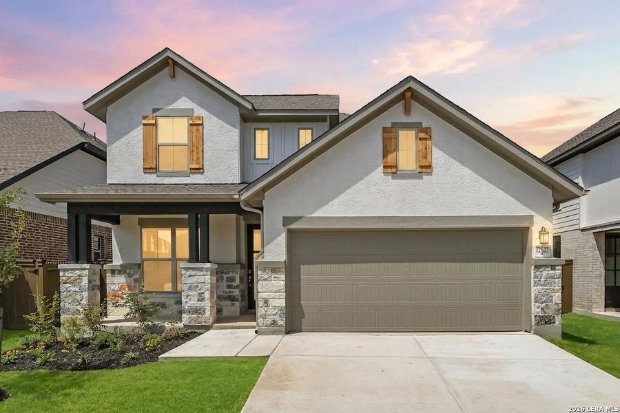 Front exterior of a new home in Stillwater Ranch, San Antonio, TX, highlighting curb appeal (Image 2). Front exterior of a new home in Stillwater Ranch, San Antonio, TX, highlighting curb appeal (Image 2).
