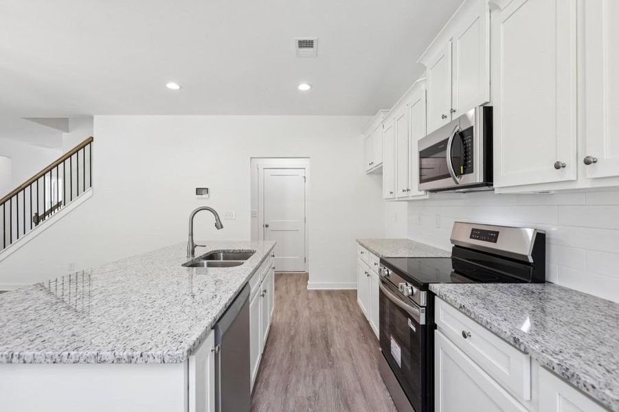 Furnished interior view inside a new home in Savoy Park, Covington (Image 7).