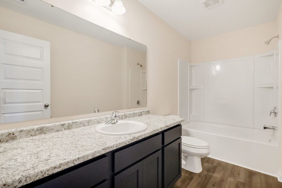 Representative furnished interior of a home built from the The Bagley by RTS Homes in Grand Reserve, Hinesville (Image 11).