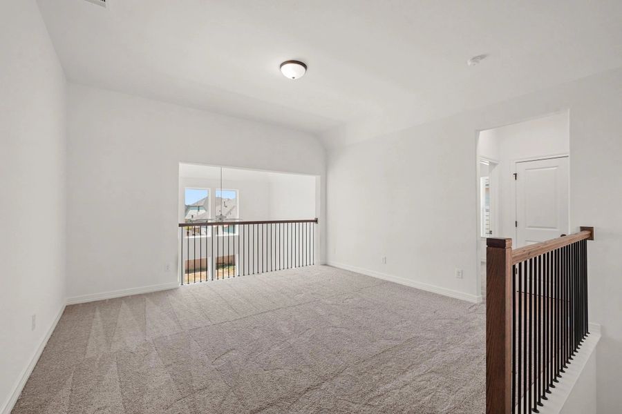 Loft. "Note: Sample product photo. Actual exterior and interior selections may vary by homesite. Photo may be virtually staged