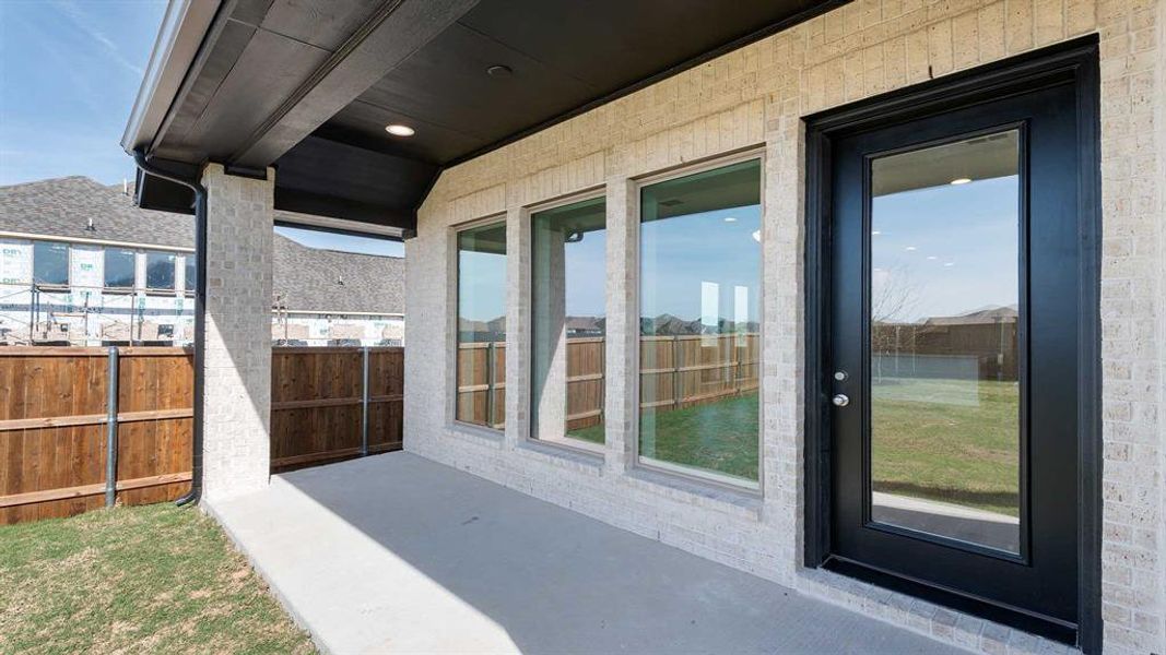 Exterior details and patio area of a home in Devonshire, Forney (Image 3).