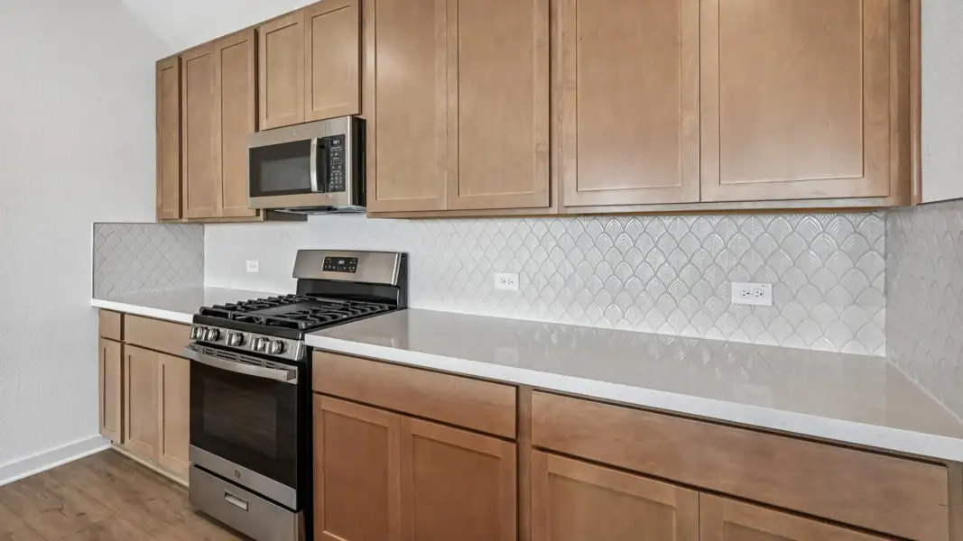 Furnished interior view inside a new home in Flora, Hutto (Image 17).