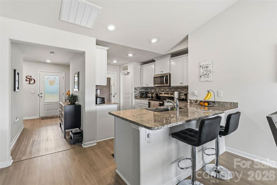 Furnished interior view inside a new home in McKee Creek Village, Charlotte (Image 9).
