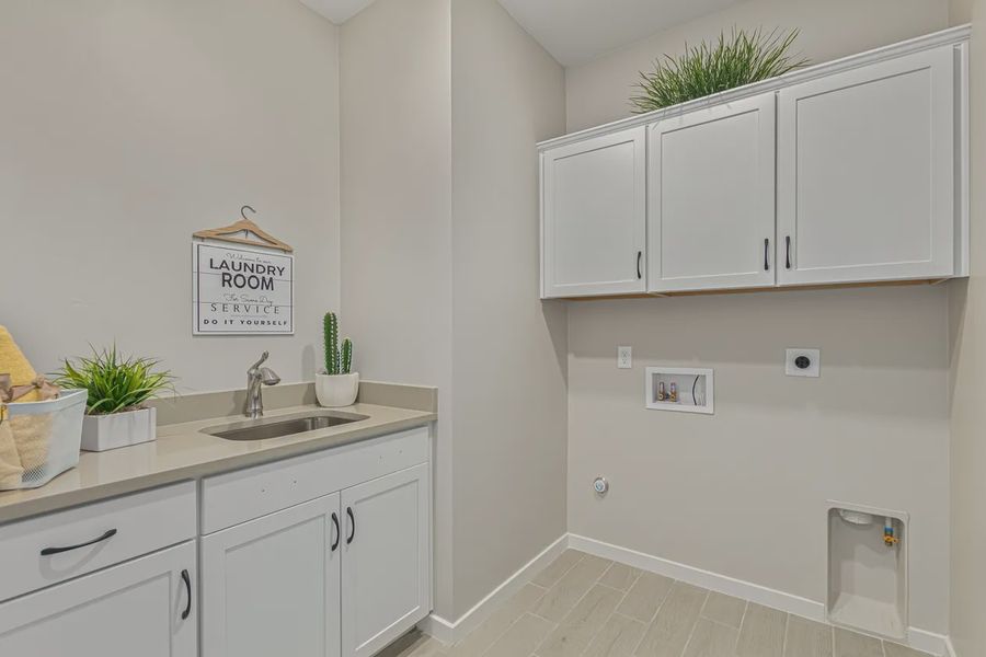 Representative furnished interior of a home built from the 1901 by Elliott Homes in Camilo at Santana, Yuma (Image 25).