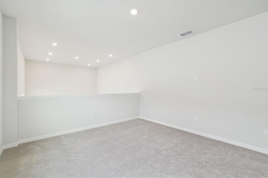 Spacious, unfurnished interior of a new home in Laureate Park at Lake Nona - Garden Series, Orlando (Image 42).