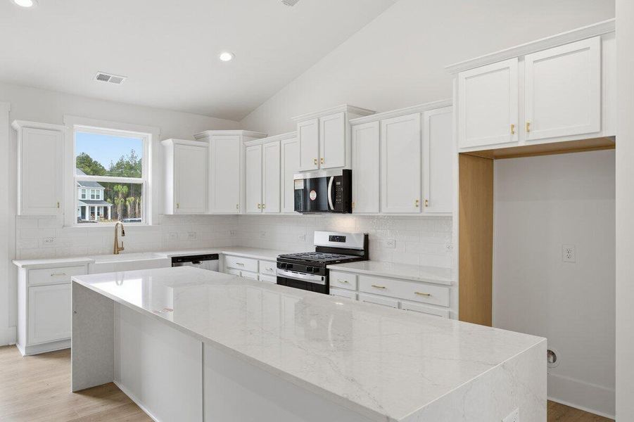 Furnished interior view inside a new home in , Ravenel (Image 2). Furnished interior view inside a new home in , Ravenel (Image 2).