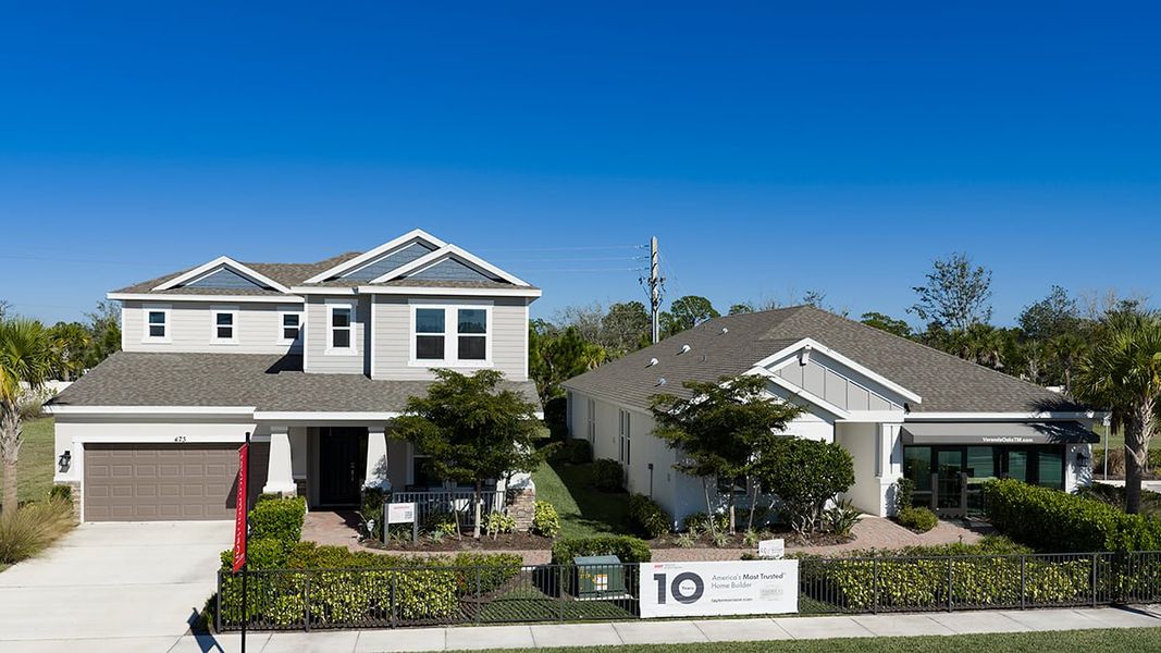 Front exterior of a new home in Veranda Oaks, Port St. Lucie, FL, highlighting curb appeal (Image 16).