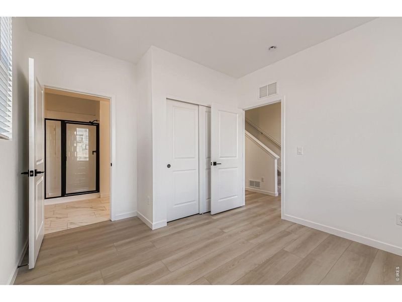 Spacious, unfurnished interior of a new home in Parkside West at Baseline, Broomfield (Image 19).