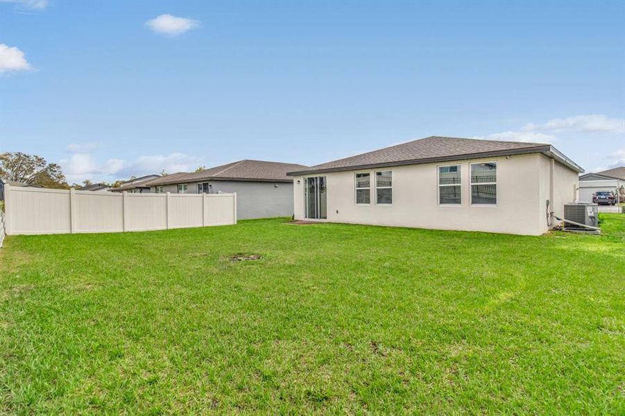Exterior details and patio area of a home in Lawson Dunes - Signature Series, Haines City (Image 4).