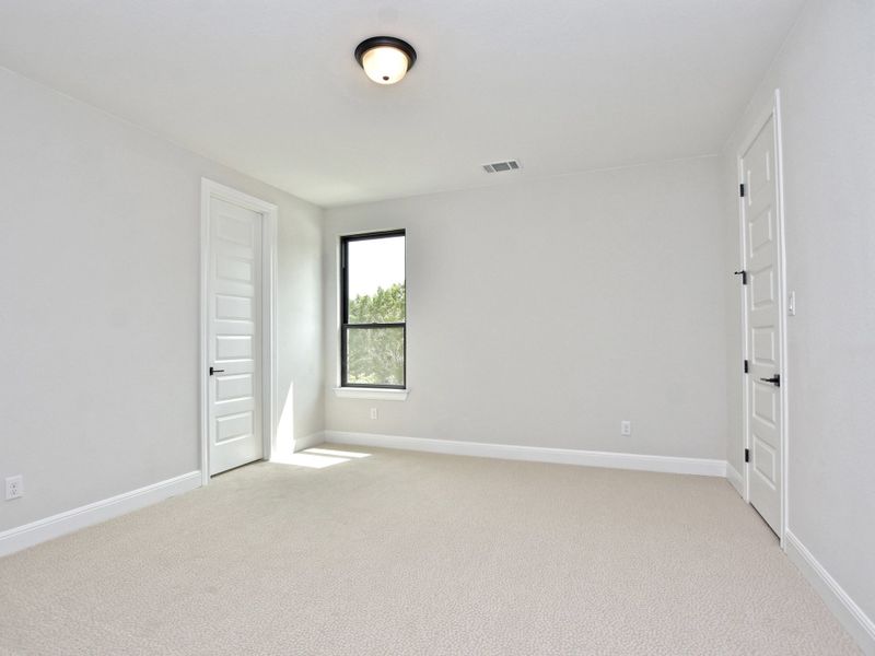 Representative unfurnished interior of a home built from the Santa Barbara II by Giddens Homes in Scofield Farms Estates, Georgetown (Image 155).