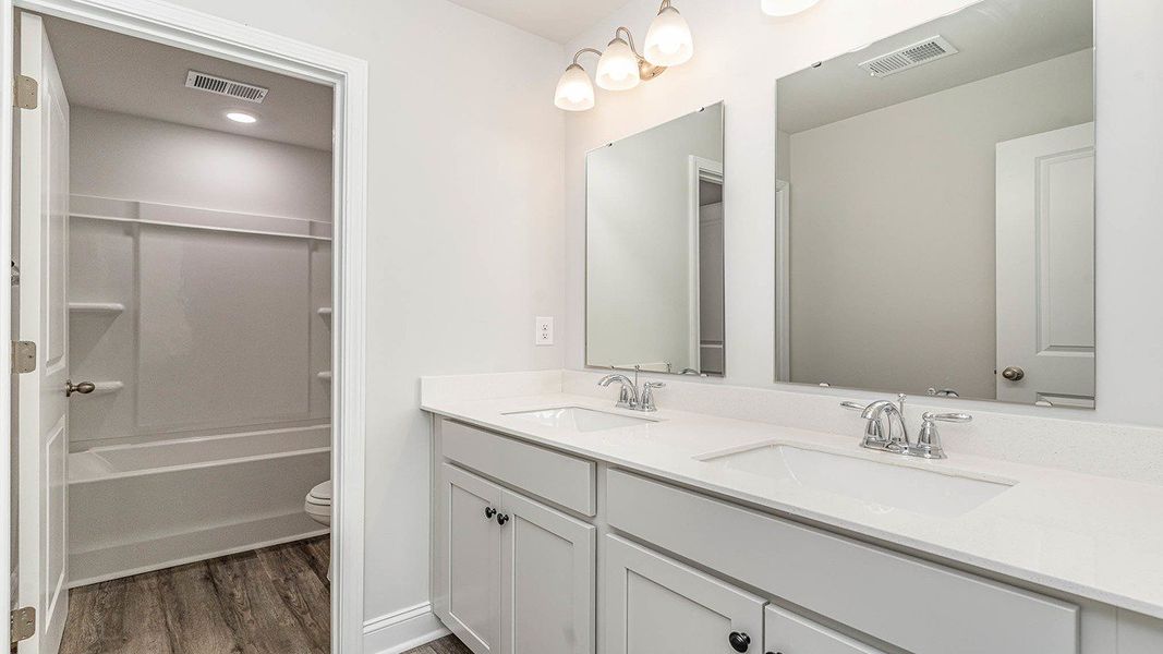 Representative furnished interior of a home built from the HARBOR OAK by D.R. Horton in Haven View, Murrells Inlet (Image 12).