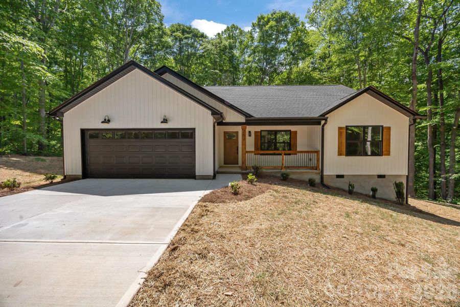 Front exterior of a new home in , Statesville, NC, highlighting curb appeal (Image 15).