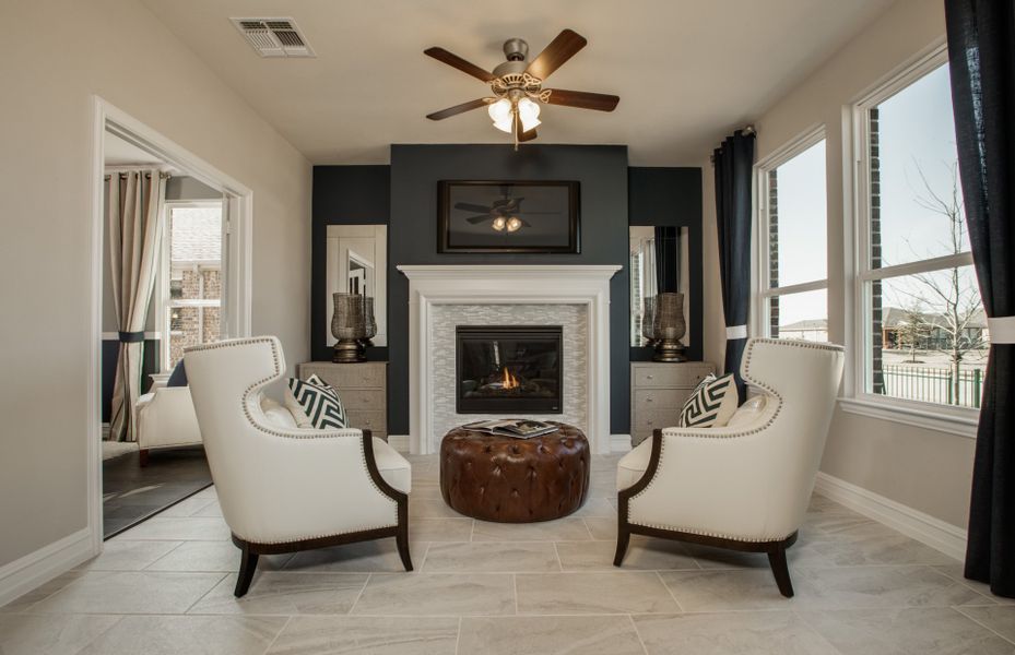 The hearth room, a cozy space of the cafe and near the study, shown with the optional fireplace