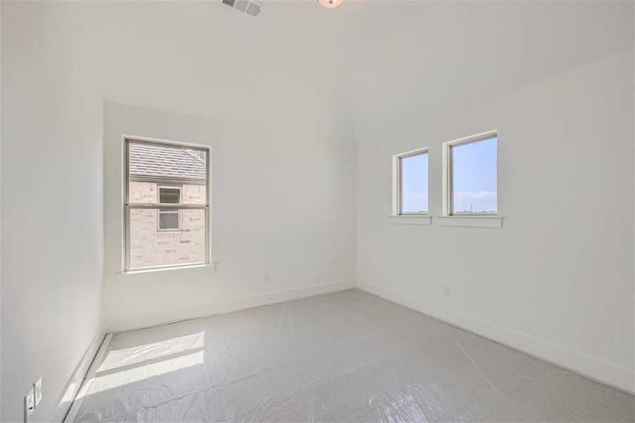 Empty room featuring carpet flooring