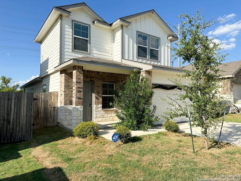 Front exterior of a new home in Stoney Creek, San Antonio, TX, highlighting curb appeal (Image 17). Front exterior of a new home in Stoney Creek, San Antonio, TX, highlighting curb appeal (Image 17).