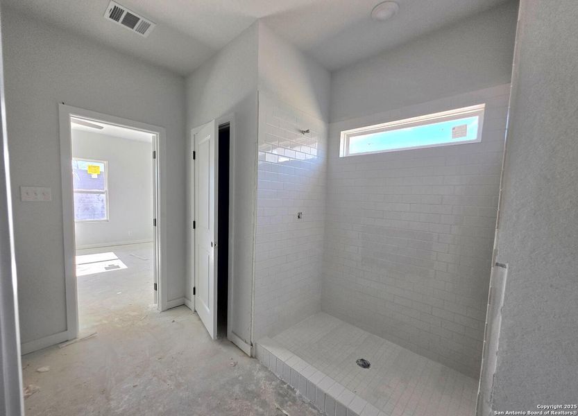 In-progress construction of a new home in The Summit at Saddlebrook Ranch 55's, Schertz, TX (Image 14).