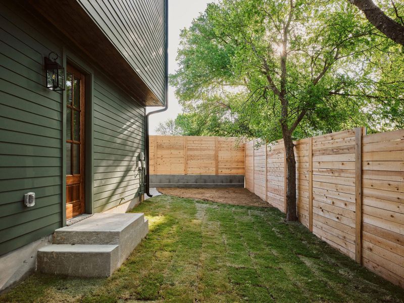 View of fenced backyard
