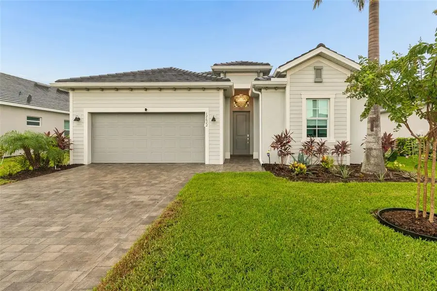 Front exterior of a new home in , Venice, FL, highlighting curb appeal (Image 2). Front exterior of a new home in , Venice, FL, highlighting curb appeal (Image 2).