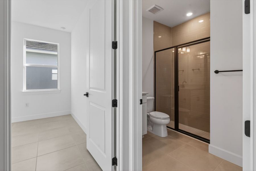 Furnished interior view inside a new home in Costa Pointe, Vero Beach (Image 37).