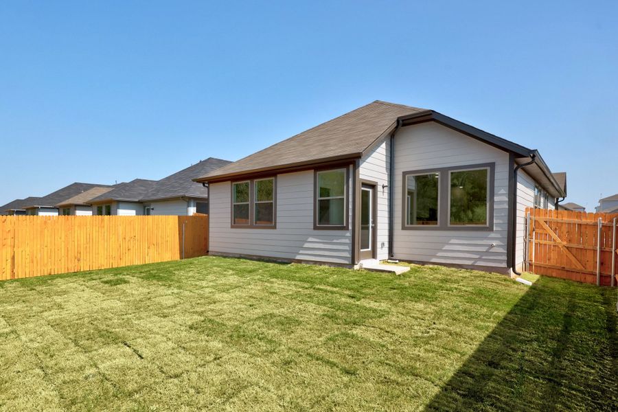 Exterior details and patio area of a home in Trinity Ranch, Elgin (Image 21).