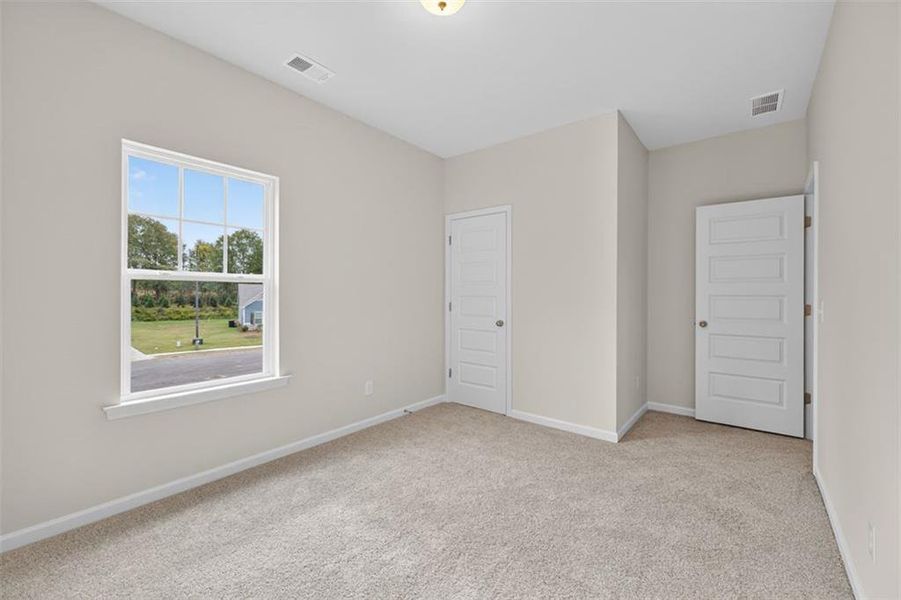 Spacious, unfurnished interior of a new home in Garrett Preserve, Douglasville (Image 41).