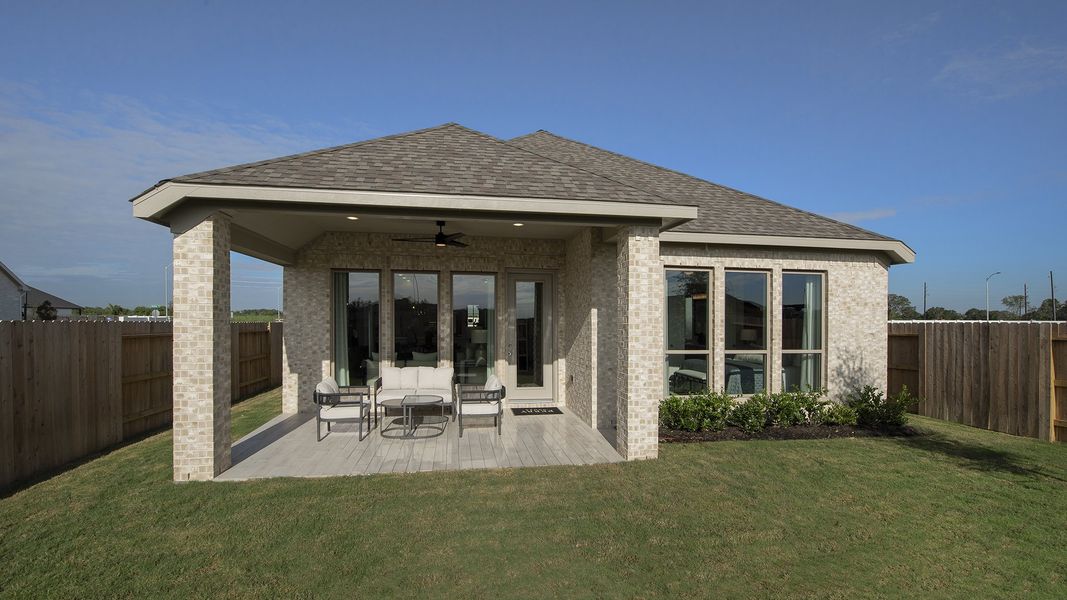 Representative exterior photo of a completed home built from the 1942W by Perry Homes in Ladera 45', San Antonio, TX (Image 9).