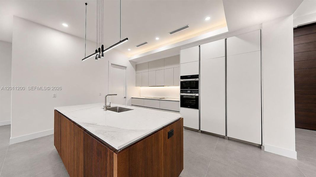 Furnished interior view inside a new home in , Miami Lakes (Image 15).