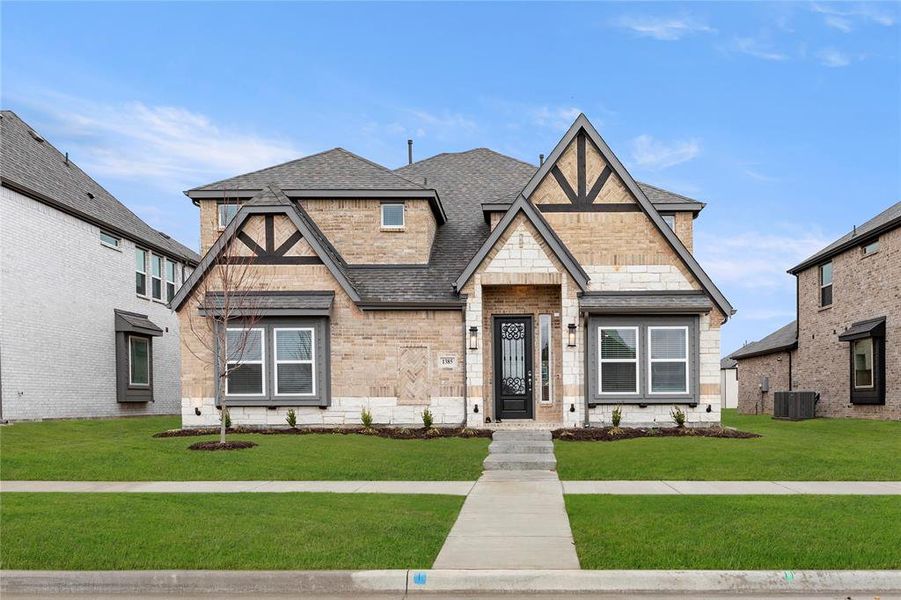 Front exterior of a new home in Villages of Creekwood, Frisco, TX, highlighting curb appeal (Image 16).