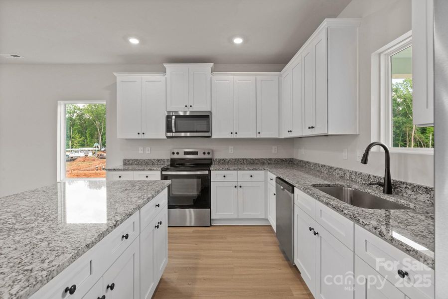Furnished interior view inside a new home in Ascot Woods, Charlotte (Image 5).