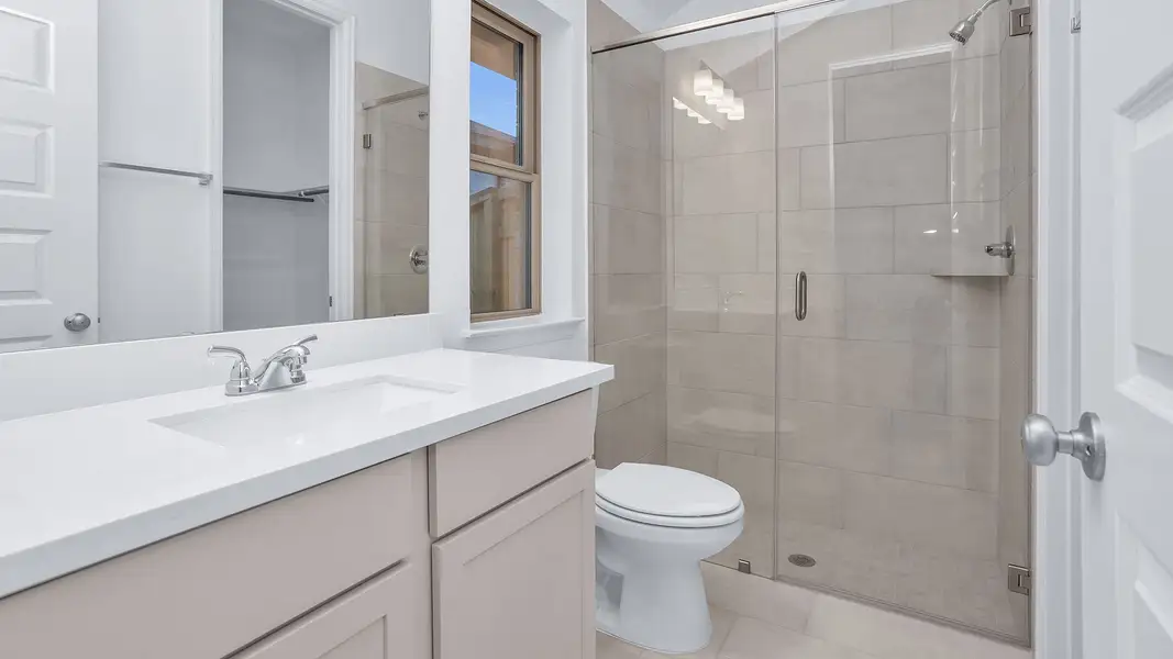 Furnished interior view inside a new home in Grand Central Park, Conroe (Image 8).