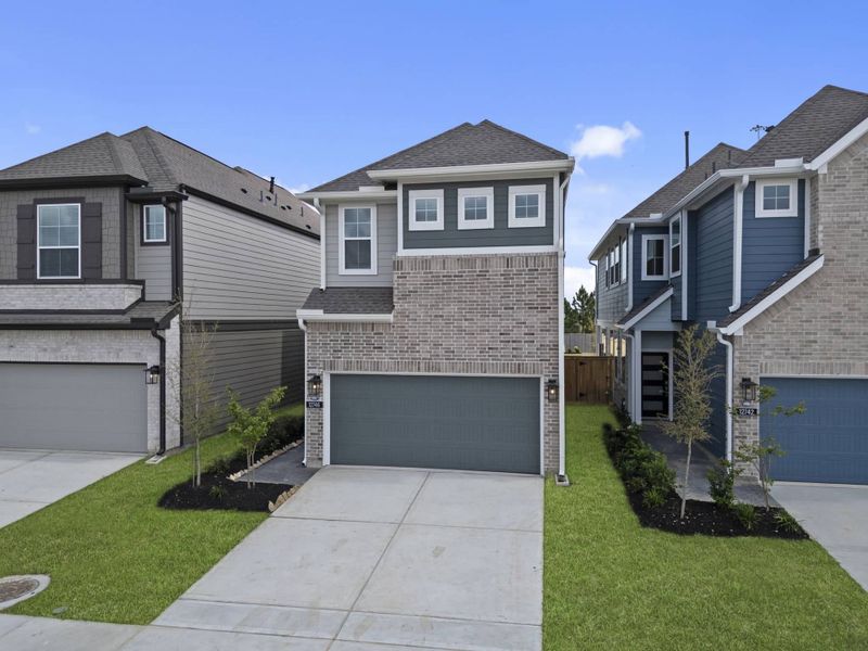 Front exterior of a new home in Bridgeland, Cypress, TX, highlighting curb appeal (Image 22).