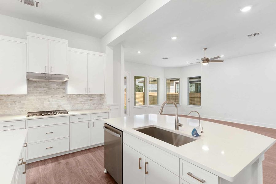 Furnished interior view inside a new home in Lariat, Liberty Hill (Image 7). Furnished interior view inside a new home in Lariat, Liberty Hill (Image 7).