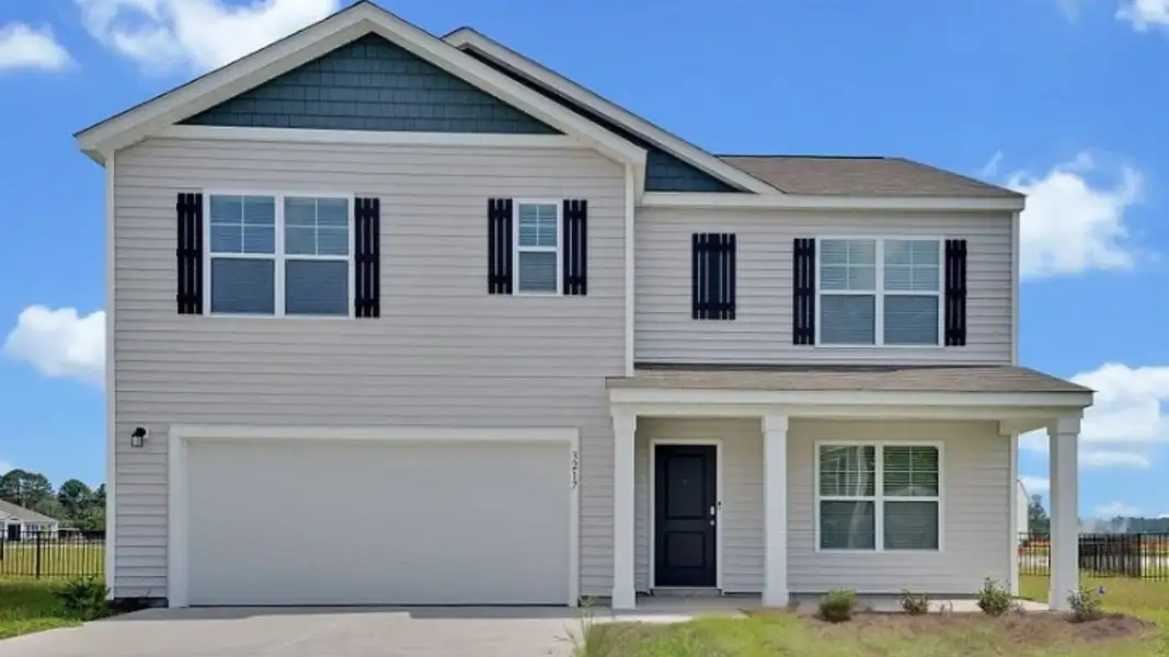 Front exterior of a new home in Cedar Hill Landing, Navassa, NC, highlighting curb appeal (Image 1). Front exterior of a new home in Cedar Hill Landing, Navassa, NC, highlighting curb appeal (Image 1).