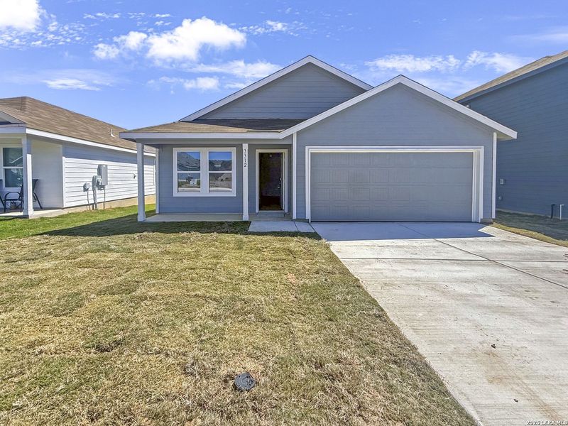 Front exterior of a new home in Ridgeland, Kerrville, TX, highlighting curb appeal (Image 1). Front exterior of a new home in Ridgeland, Kerrville, TX, highlighting curb appeal (Image 1).