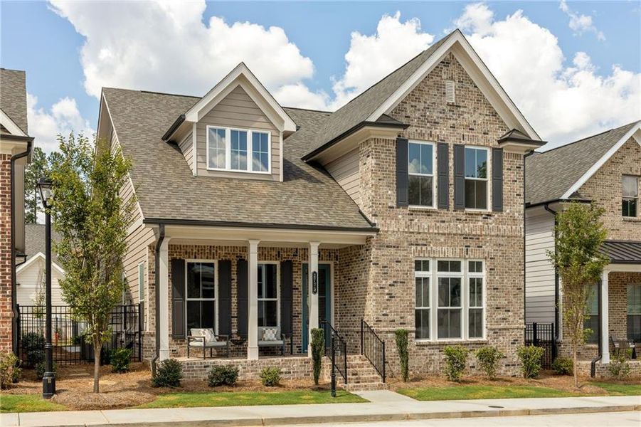 Front exterior of a new home in Evanshire Single Family, Duluth, GA, highlighting curb appeal (Image 29). Front exterior of a new home in Evanshire Single Family, Duluth, GA, highlighting curb appeal (Image 29).