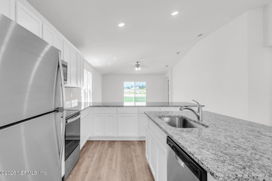 Furnished interior view inside a new home in Rolling Hills, Green Cove Springs (Image 7).