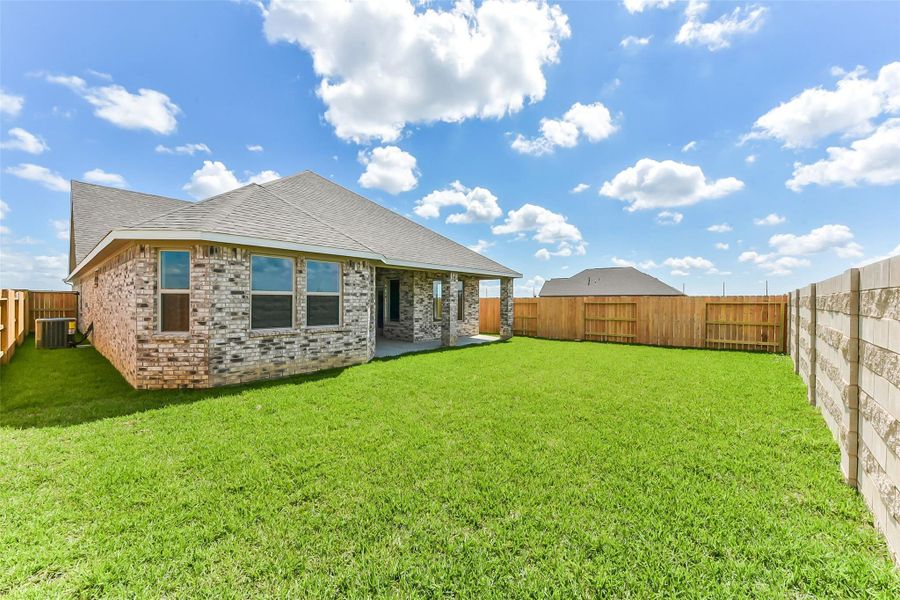Exterior details and patio area of a home in River Ranch Meadows, Dayton (Image 25).