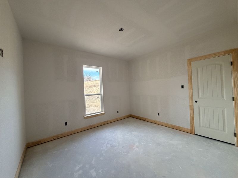 In-progress construction of a new home in Saddle Crest Estates, Weatherford, TX (Image 24).