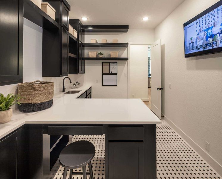 Representative furnished interior of a home built from the 216G by Highland Homes in Quail Hollow, Rockwall (Image 40).