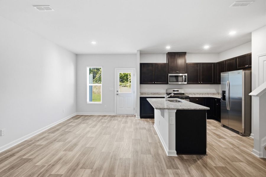 Furnished interior view inside a new home in Carpenter Falls, Durham (Image 9).