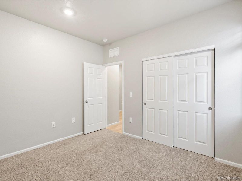 Spacious, unfurnished interior of a new home in Poudre Heights: The Alpine Collection, Windsor (Image 13).