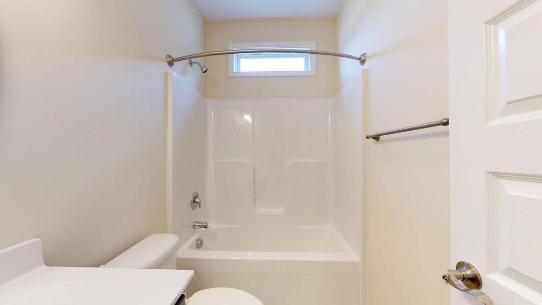 Representative furnished interior of a home built from the Fairfax A by JC Jackson Homes,LLC in Heritage Pointe, Newport (Image 10).