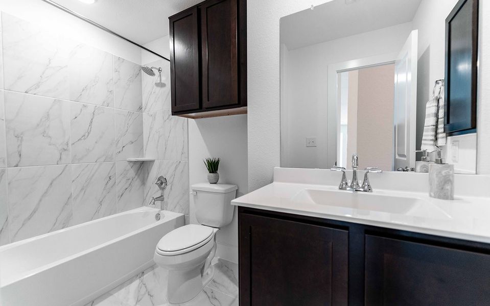 Furnished interior view inside a new home in Massey Oaks, Pearland (Image 9).