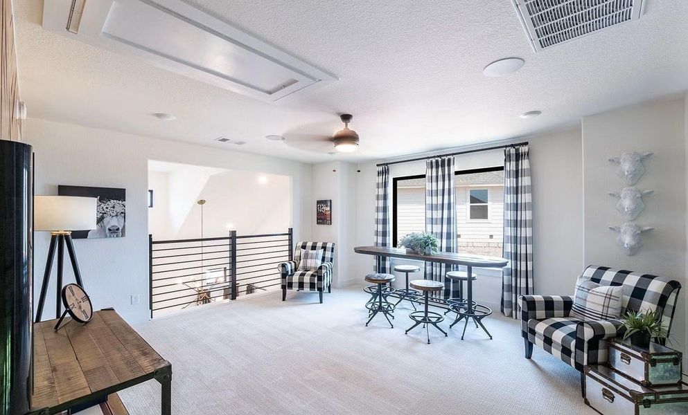 Large upstairs game room offering flexible space for entertainment, hobbies, or casual gatherings, a great bonus area for everyday living. **Photos are representative only and may vary as built.**