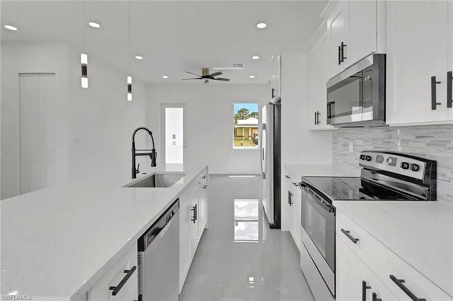 Furnished interior view inside a new home in , Lehigh Acres (Image 8).