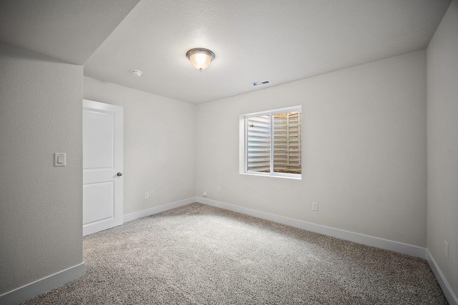 Spacious, unfurnished interior of a new home in Ridge at Lorson Ranch, Colorado Springs (Image 31).